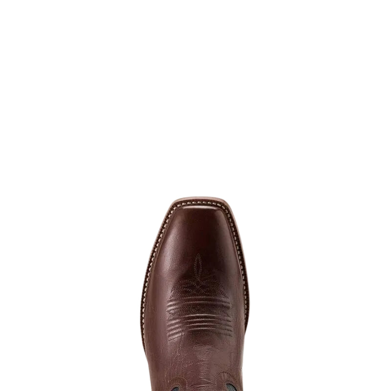 Close up of  brown leather boot toe with intricate stitch pattern on a plain white background.