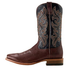 Brown Cowboy boot with a black upper shaft and intricate brown stitching on a white background