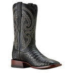 Black Caiman skin cowboy boot with intricate stich patterns on a white background. 