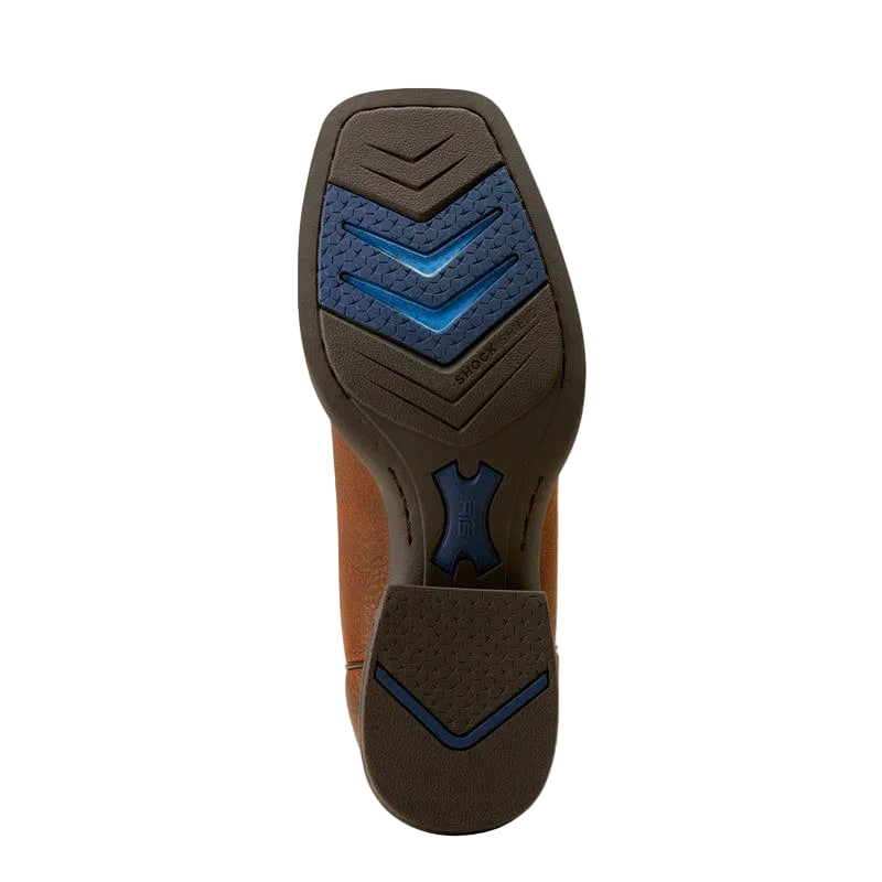 Close up of a boot black rubber boots sole highlighting the tread pattern and blue accents. 