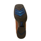 Close up of a boot black rubber boots sole highlighting the tread pattern and blue accents. 