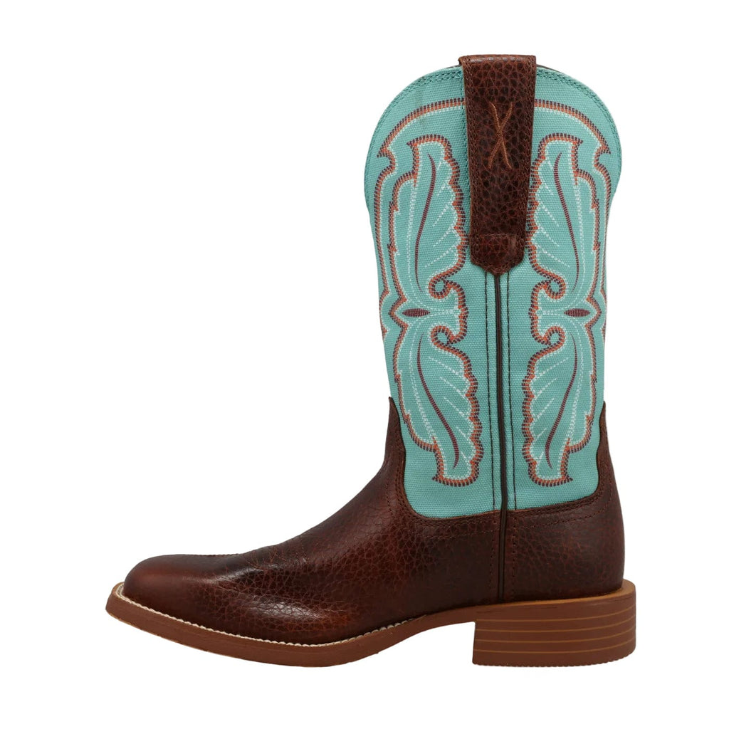 Brown Cowboy Boots featuring a turquoise upper shaft & showing an intricate stitch pattern. 