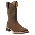Brown cowboy boot with intricate design on a White background